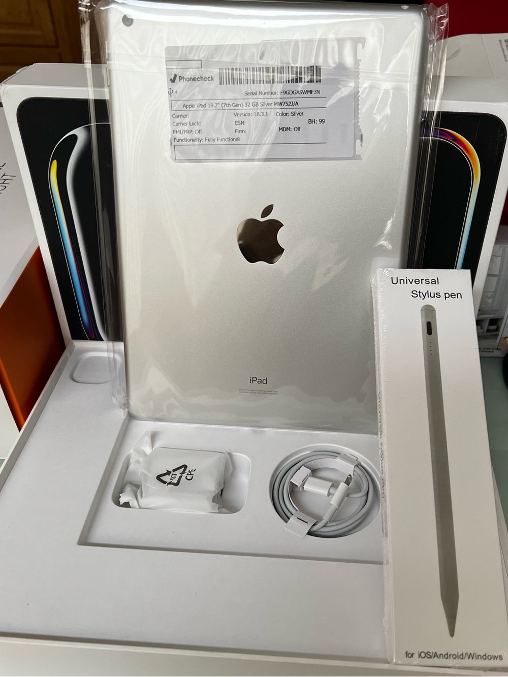 Apple iPad Silver Tablet with Included Cable
